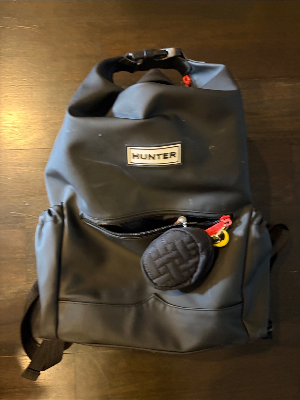 Hunter Black Roll-Top Backpack with Red Accent Pulls